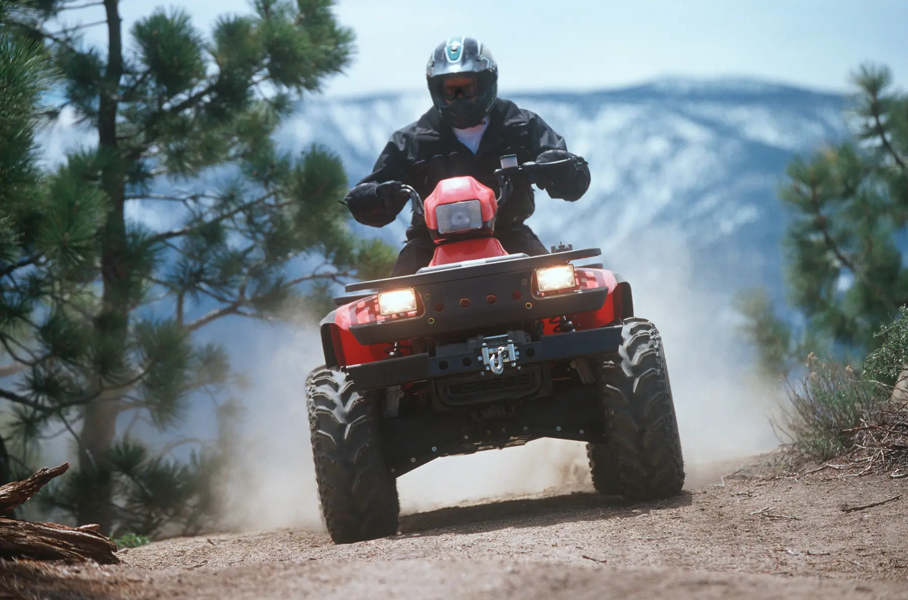 ATV on dusty forest road. Photo JMichl iStock 1
